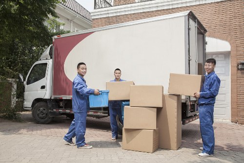 Student removals team planning a move in Marylebone with boxes and access checks