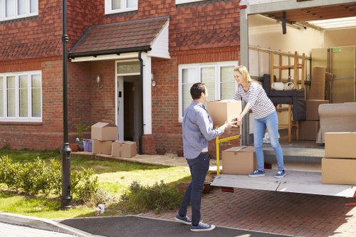 Careful loading of student belongings for a Marylebone relocation service