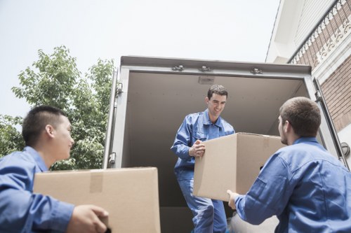 Packed boxes and furniture prepared for a flat move in Marylebone