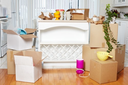 Professional team preparing and protecting furniture for a move in Marylebone