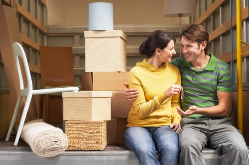 Professional movers handling stair access in a Marylebone apartment building